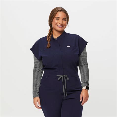 This jumpsuit has feminine cap sleeves, a flattering adjustable elastic waistline, Review FIGS Scrubs The Vibrant Med. . Figs scrub jumpsuit